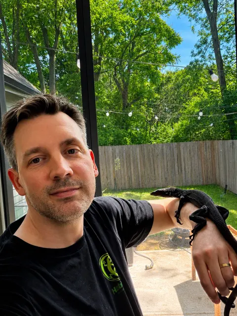 Bradley Enrici with a black tree monitor on his wrist